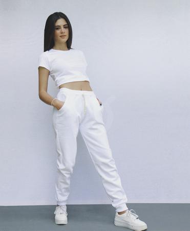 <p>Pantalon calentador con rib en cintura y bastas. 2 bolsillos. Cordon en cintura. Tela fleece perchado polialgon. Corte MUJER.</p>

<p>&nbsp;</p>

